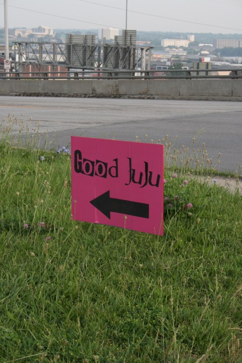 Good JuJu sign in grass
